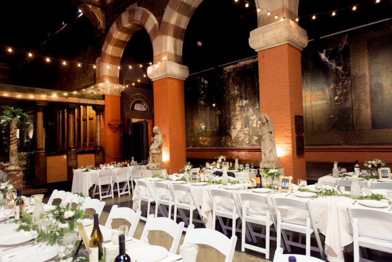 White Padded Chairs at a Wedding Venue